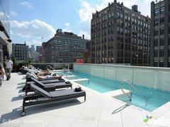 someone in the trump soho is selling his condo, and he'll only accept bitcoin